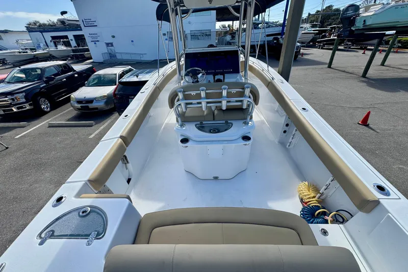 Slide: The Image of 2017 Sportsman Heritage 251 Center Console boat interior with seating and console view. - 15