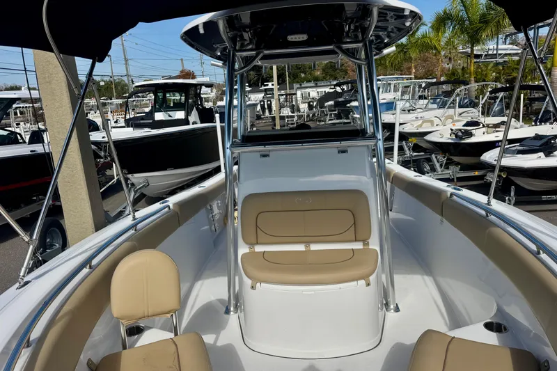 Slide: The Image of 2017 Sportsman Heritage 251 Center Console boat interior with seating and console view. - 29