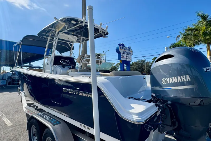 Slide: The Image of 2017 Sportsman Heritage 251 Center Console boat with Yamaha engine on trailer. - 3
