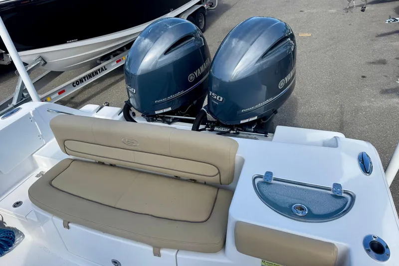 Slide: The Image of 2017 Sportsman Heritage 251 Center Console with twin Yamaha 150 engines and seating area. - 40