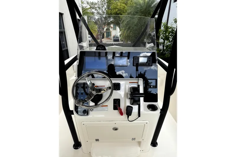 Slide: The Image of Yamaha F200XB engine label on 2022 Cobia 220 Center Console boat. - 8