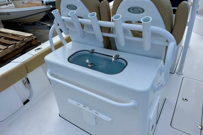 Slide: The Image of 2021 Sportsman Open 282 Center Console with rod holders and livewell on deck. - 12