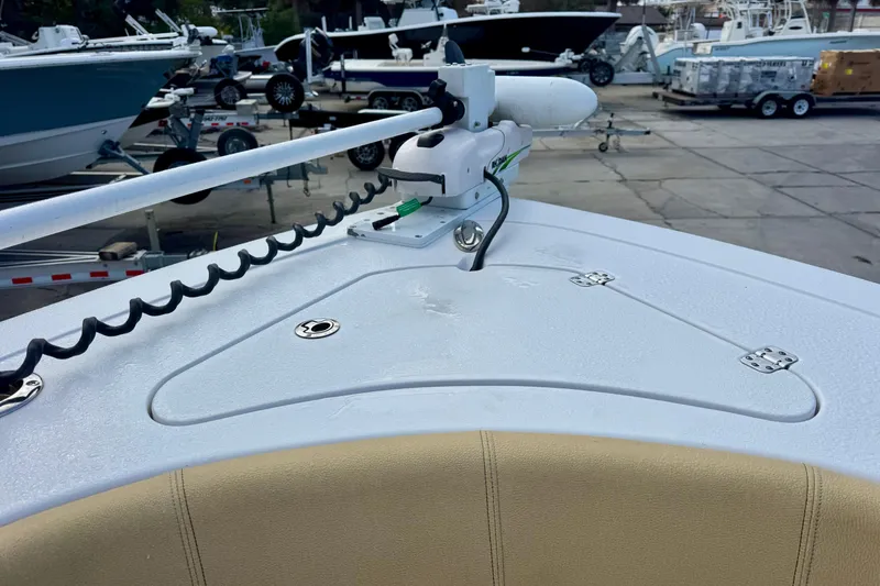 Slide: The Image of 2021 Sportsman Open 282 Center Console boat with trolling motor on deck. - 25