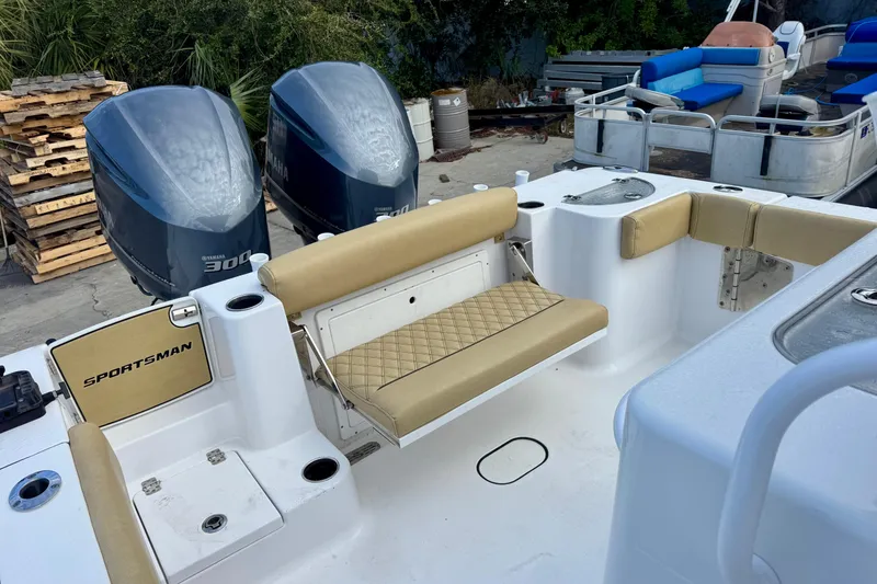 Slide: The Image of 2021 Sportsman Open 282 Center Console with dual Yamaha engines and tan seating. - 36