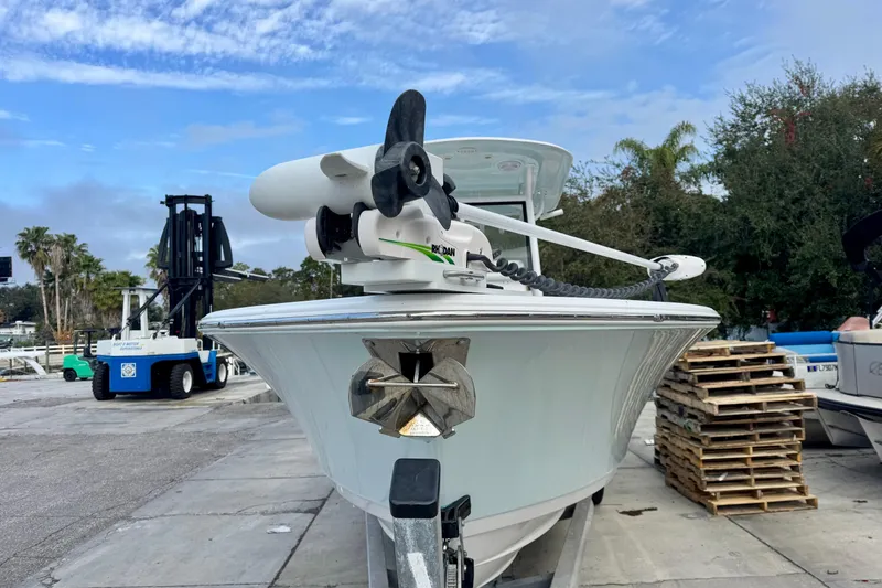 Slide: The Image of 2021 Sportsman Open 282 Center Console boat on trailer, dockside view. - 6