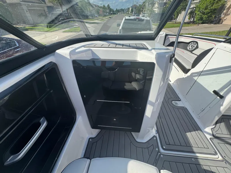 Slide: The Image of 2018 Yamaha Boats 212X interior with sleek design and modern features. - 26