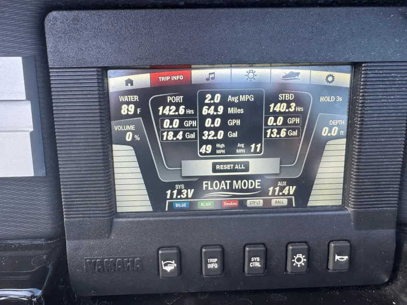 Slide: The Image of Yamaha Boats 2018 212X dashboard display showing trip info and system settings. - 31