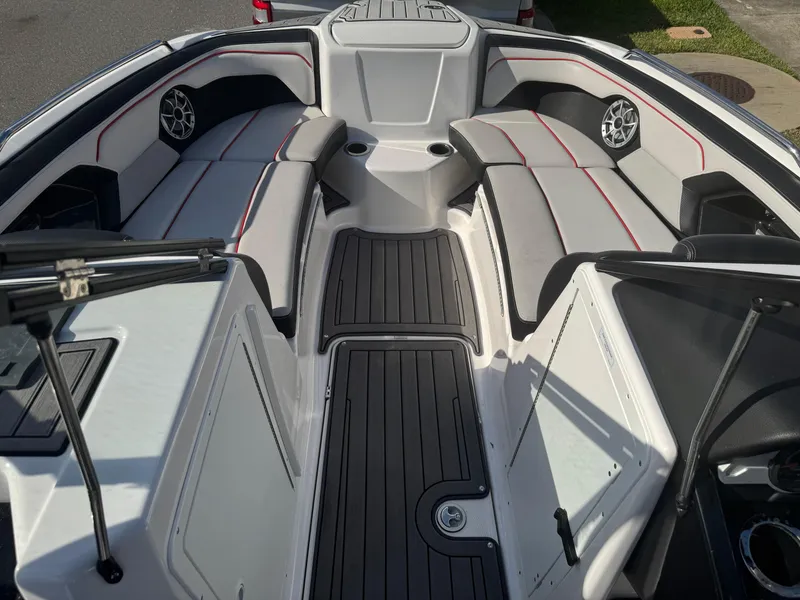 Slide: The Image of 2018 Yamaha Boats 212X interior with sleek seating and modern design. - 41