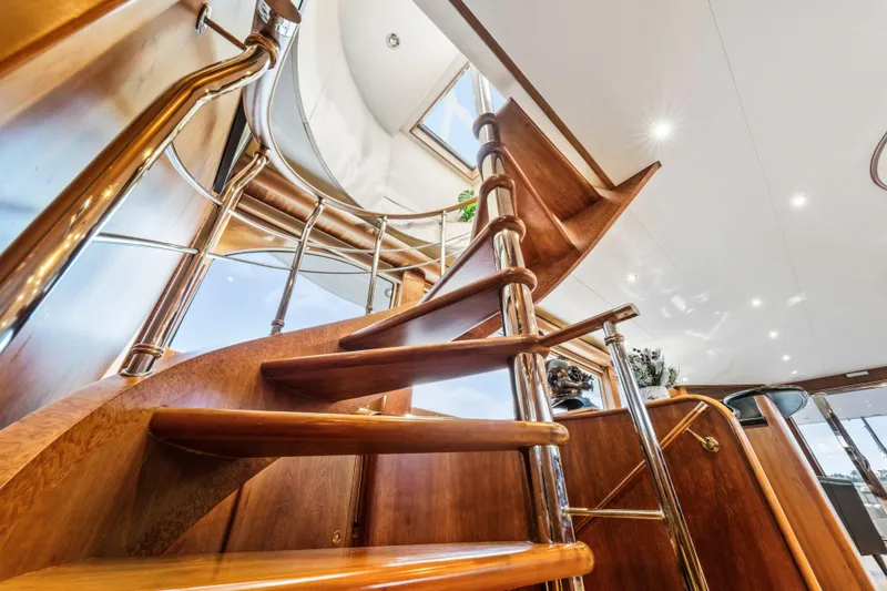 Slide: The Image of Luxurious interior of 2006 Cheoy Lee 84 Bravo yacht with elegant wood finishes and modern amenities. - 37