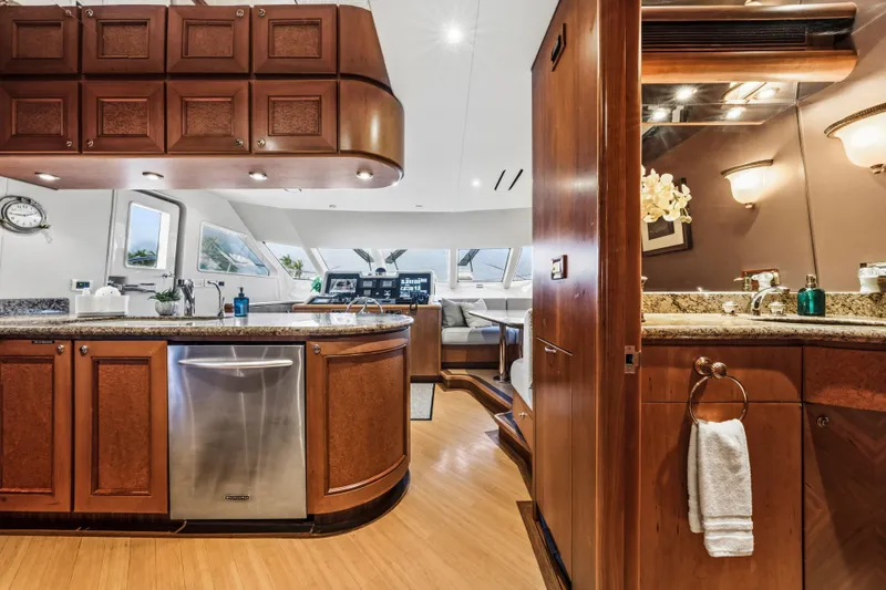 Slide: The Image of Luxurious interior of 2006 Cheoy Lee 84 Bravo yacht with helm and seating area. - 38