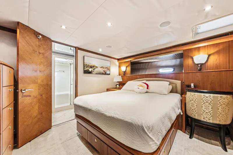 Slide: The Image of Luxurious 2006 Cheoy Lee 84 Bravo yacht interior with elegant wood finishes and modern amenities. - 40