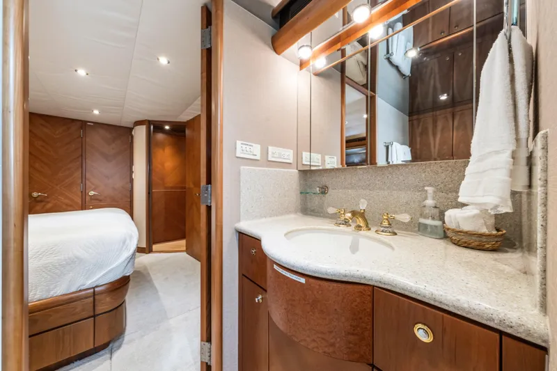 Slide: The Image of Luxurious bathroom in 2006 Cheoy Lee 84 Bravo yacht with elegant fixtures and skylight. - 41