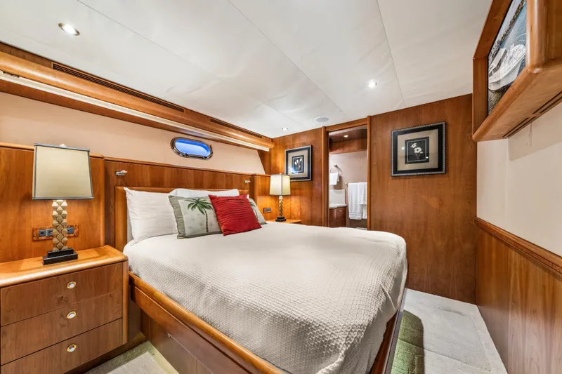 Slide: The Image of Luxurious bedroom interior of 2006 Cheoy Lee 84 Bravo yacht with elegant wood finishes. - 47