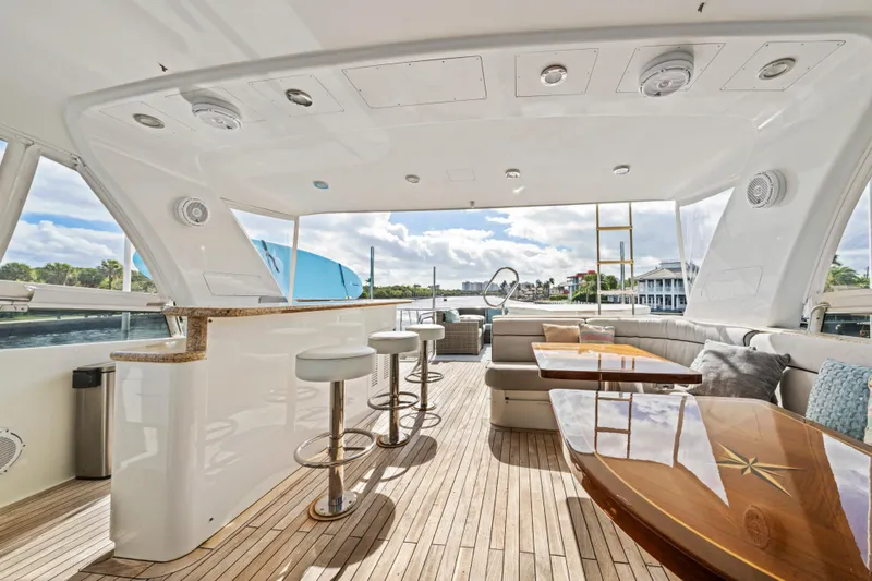 Slide: The Image of Helm of 2006 Cheoy Lee 84 Bravo yacht with navigation screens and controls. - 31