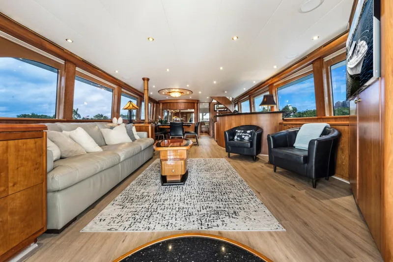 Slide: The Image of Luxurious interior of 2006 Cheoy Lee 84 Bravo yacht with elegant furnishings and large windows. - 34