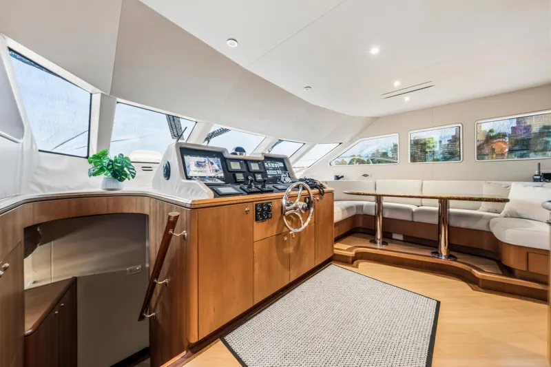 Slide: The Image of Luxurious bedroom interior of 2006 Cheoy Lee 84 Bravo yacht with elegant wood finishes. - 39