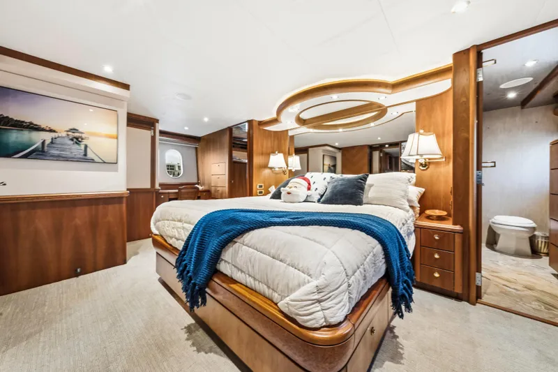 Slide: The Image of Luxurious interior of 2006 Cheoy Lee 84 Bravo yacht with elegant wood furnishings. - 43