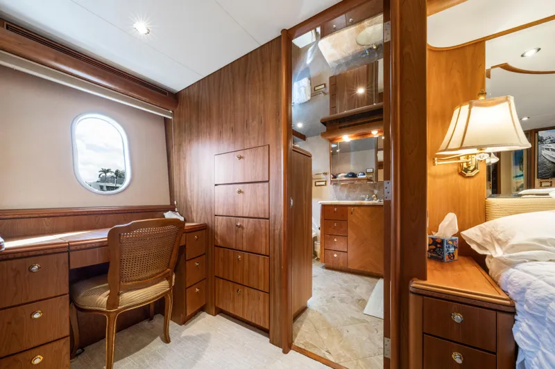 Slide: The Image of Luxurious bathroom in 2006 Cheoy Lee 84 Bravo yacht with marble countertop and glass shower. - 44