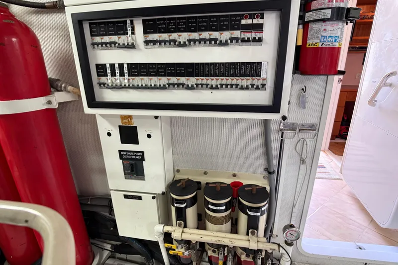 Slide: The Image of Engine room of 2006 Cheoy Lee 84 Bravo yacht, showcasing equipment and machinery. - 60