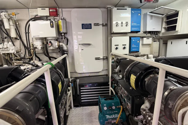 Slide: The Image of Engine room of 2006 Cheoy Lee 84 Bravo yacht, featuring Northern Lights generator. - 62