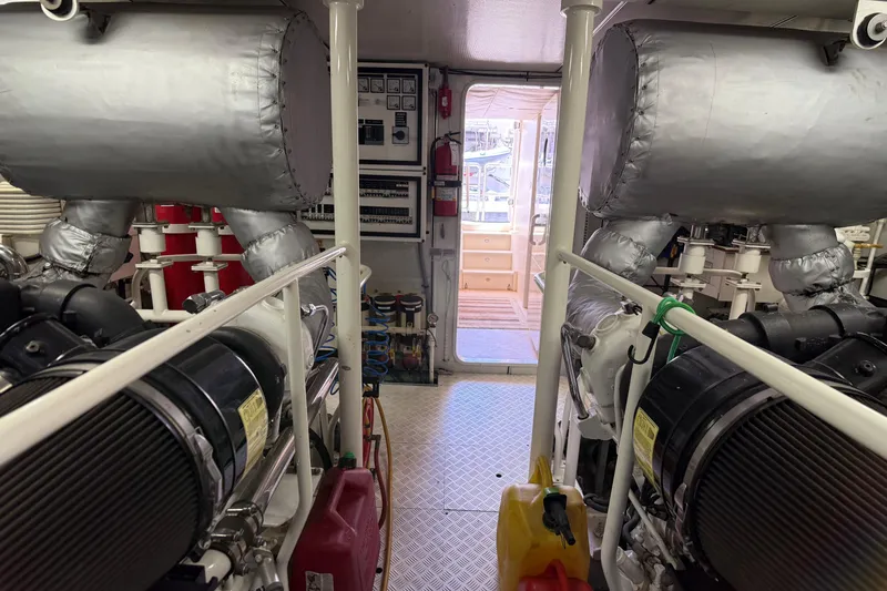 Slide: The Image of Engine room of 2006 Cheoy Lee 84 Bravo yacht with CAT engine and Northern Lights generator. - 65