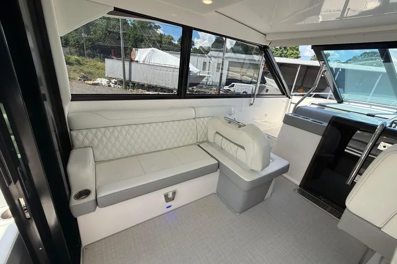 Slide: The Image of Luxurious interior of 2022 Regal 36 XO yacht with elegant seating and modern design. - 25