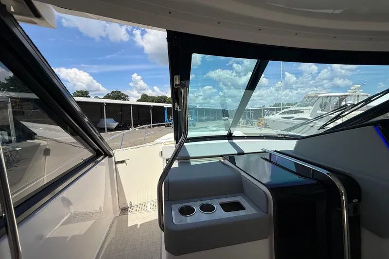 Slide: The Image of Interior view of 2022 Regal 36 XO yacht, featuring sleek design and modern amenities. - 42