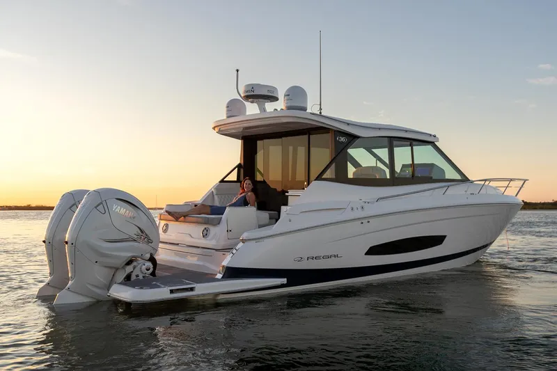 Slide: The Image of Manufacturer Provided Image: 2022 Regal 36 XO boat cruising at sunset. - 68