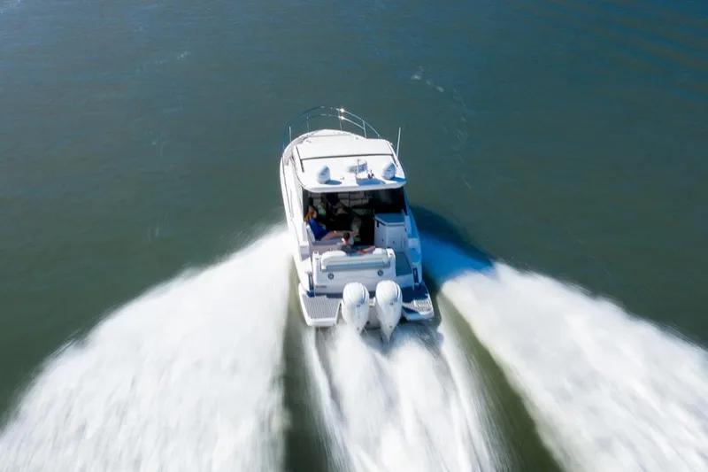 Slide: The Image of Manufacturer Provided Image: 2022 Regal 36 XO boat cruising on open water. - 72