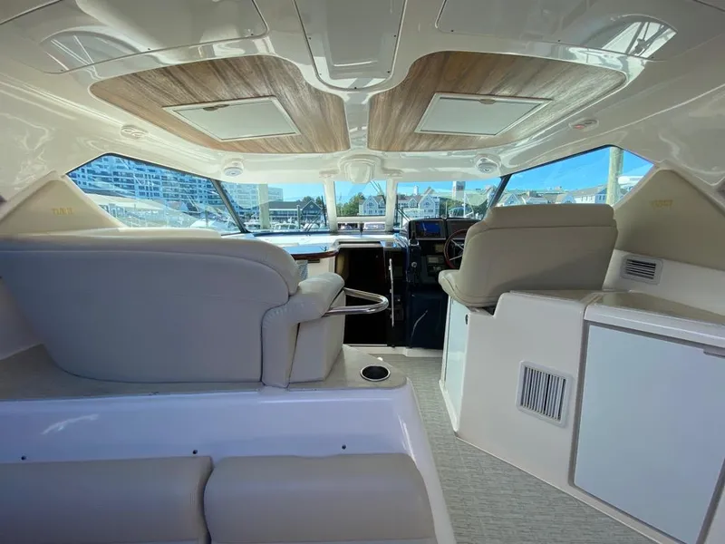 Slide: The Image of Interior of 2009 Tiara Yachts 4300 Sovran with luxurious seating. - 10