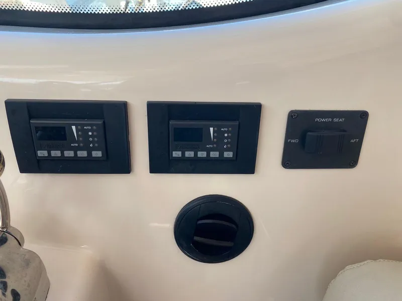 Slide: The Image of 2009 Tiara Yachts 4300 Sovran control panel close-up. - 12