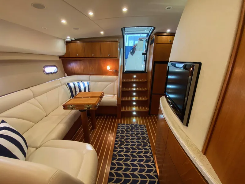 Slide: The Image of Interior of 2009 Tiara Yachts 4300 Sovran with elegant furnishings. - 17