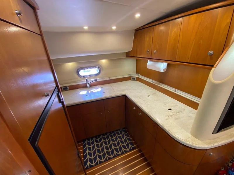 Slide: The Image of Interior of 2009 Tiara Yachts 4300 Sovran featuring elegant kitchen. - 22