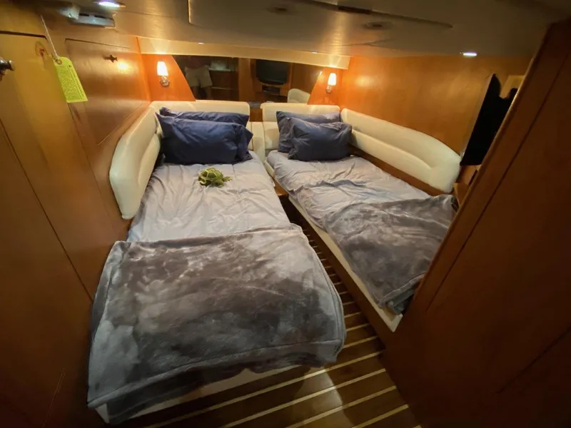 Slide: The Image of Interior of 2009 Tiara Yachts 4300 Sovran with twin beds. - 30