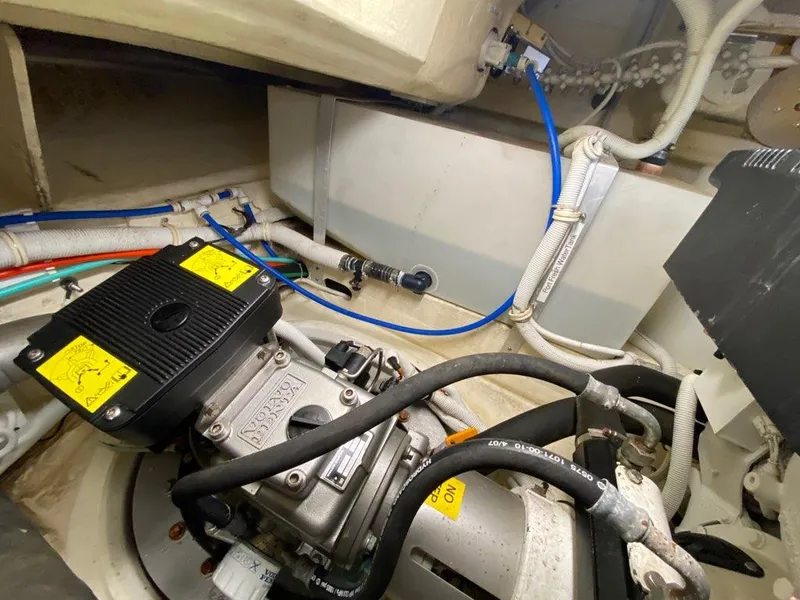 Slide: The Image of Engine room of 2009 Tiara Yachts 4300 Sovran with cables and hoses. - 45