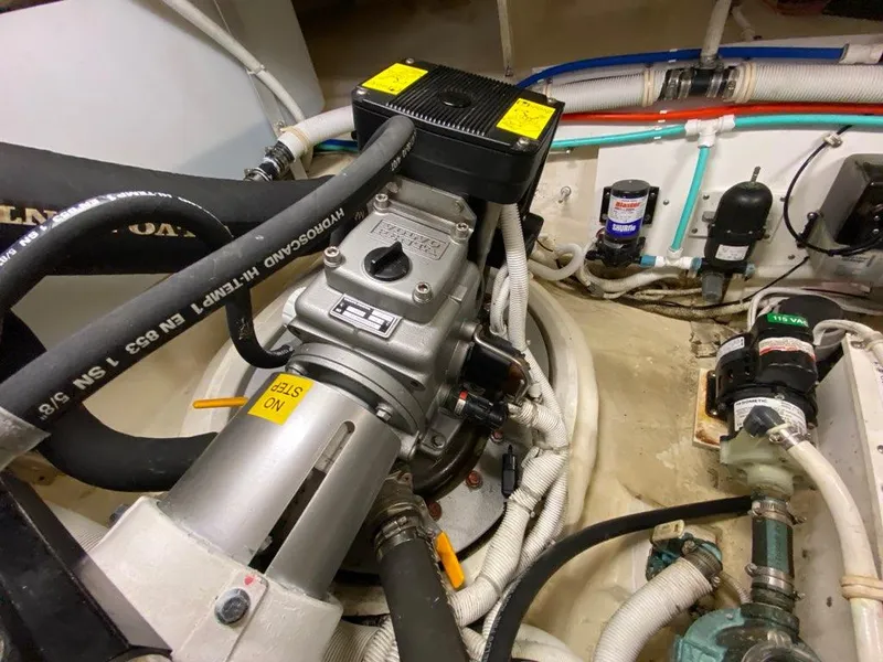 Slide: The Image of Engine room of 2009 Tiara Yachts 4300 Sovran with hoses and machinery. - 46