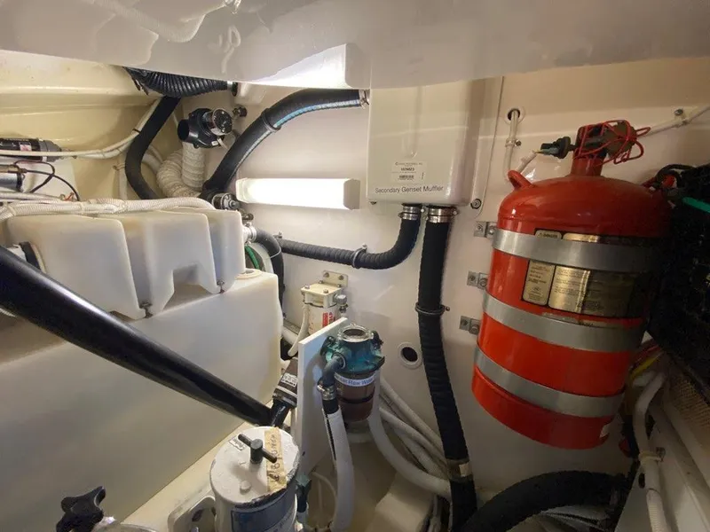 Slide: The Image of Engine room of 2009 Tiara Yachts 4300 Sovran with fire extinguisher. - 49