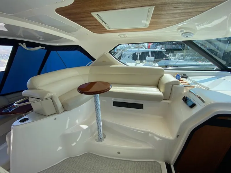 Slide: The Image of Interior of a 2009 Tiara Yachts 4300 Sovran with leather seating. - 9