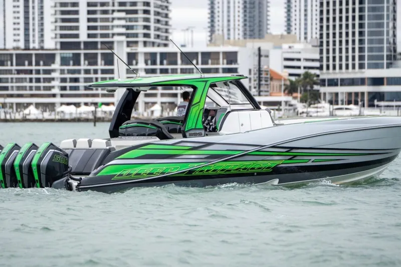 The Image of 2024 Deep Impact 399 Sport boat on water with city skyline. - 0