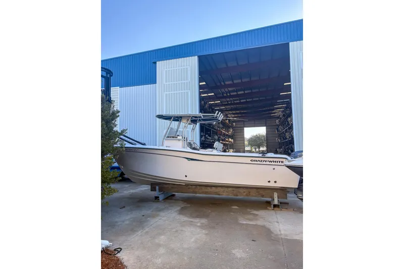 Slide: The Image of 2001 Grady-White Chase 263 boat in storage facility, side view. - 3