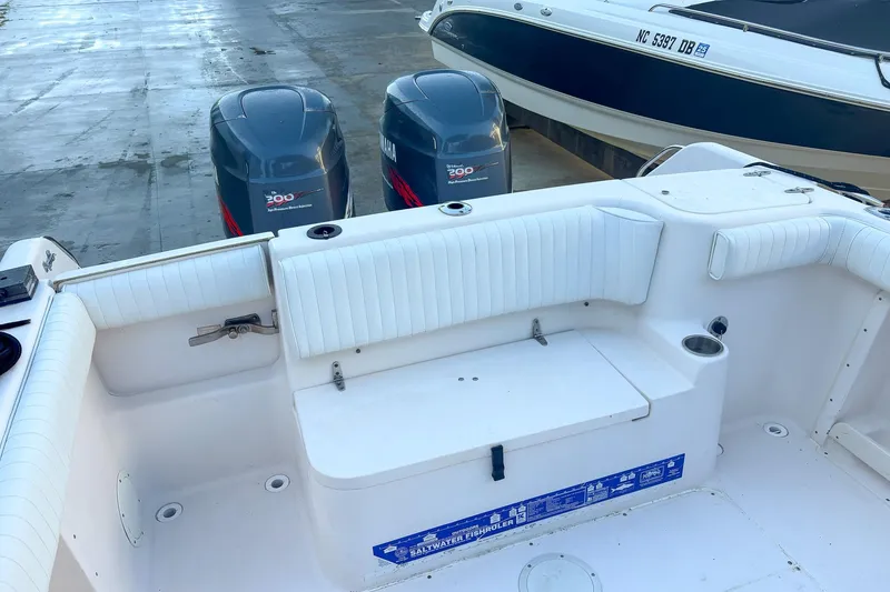 Slide: The Image of 2001 Grady-White Chase 263 boat with twin Yamaha 200 engines, white seating. - 6