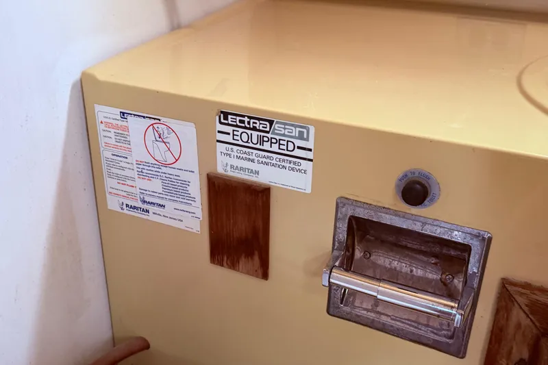 Slide: The Image of 1978 Mainship 34 Trawler marine sanitation device with Raritan Lectra/San system. - 36