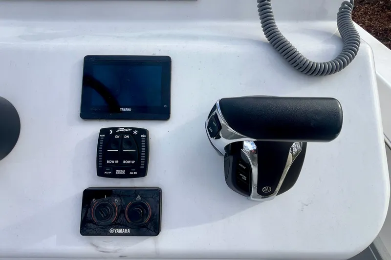 Slide: The Image of Control panel of 2023 Jones Brothers 23 Cape Fisherman Lite Tackle boat. - 12