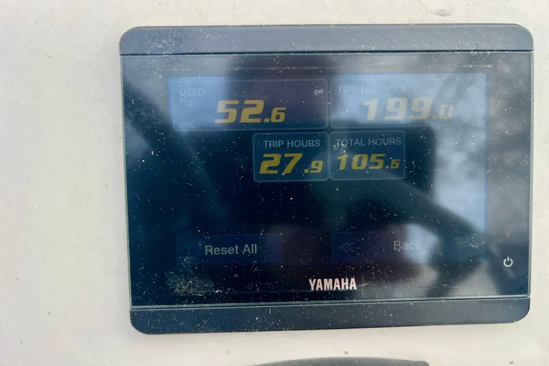 Slide: The Image of Yamaha display showing fuel usage and trip data on 2023 Jones Brothers boat. - 21