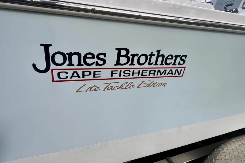Slide: The Image of Jones Brothers 23 Cape Fisherman Lite Tackle Edition boat, 2023 model, side view. - 22