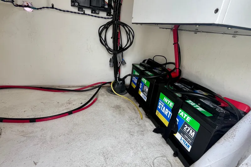 Slide: The Image of Battery compartment of 2023 Jones Brothers 23 Cape Fisherman Lite Tackle boat. - 24