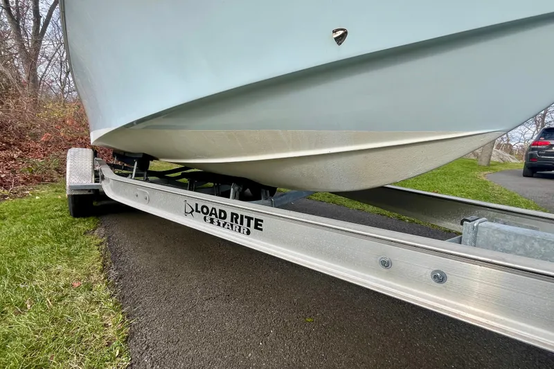 Slide: The Image of 2023 Jones Brothers 23 Cape Fisherman Lite Tackle boat on Load Rite trailer. - 30