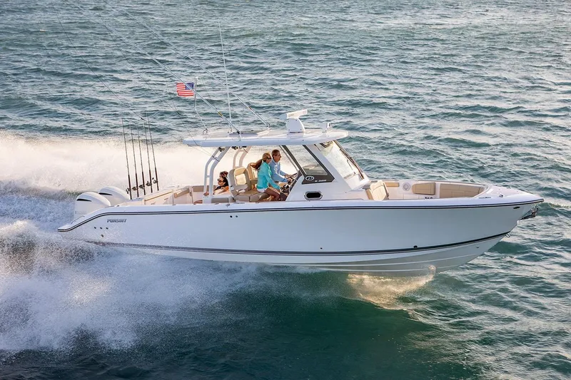 Slide: The Image of Manufacturer Provided Image: 2023 Pursuit S 328 Sport boat cruising on open water. - 6