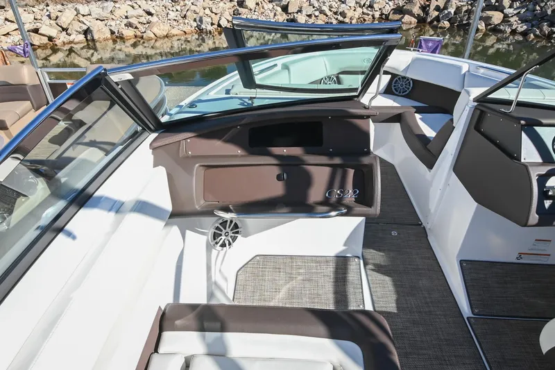 Slide: The Image of 2023 Cobalt CS22 boat interior with sleek seating and modern design. - 21
