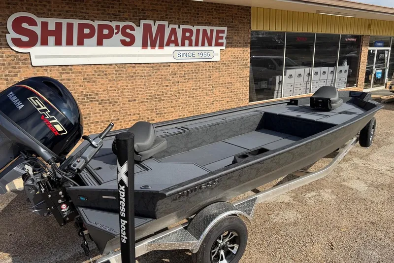 Slide: The Image of 2026 Xpress X18DB boat with Yamaha engine at Shipp's Marine dealership. - 1